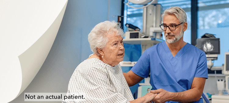 Personalized Care in Clinical Settings with DEFINITY® Healthcare professional providing personalized care to an elderly female patient after using DEFINITY® in a clinical environment